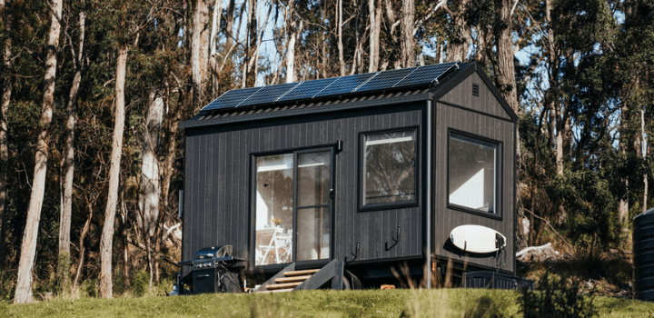 Tiny house surrounded by native Australian bushland.