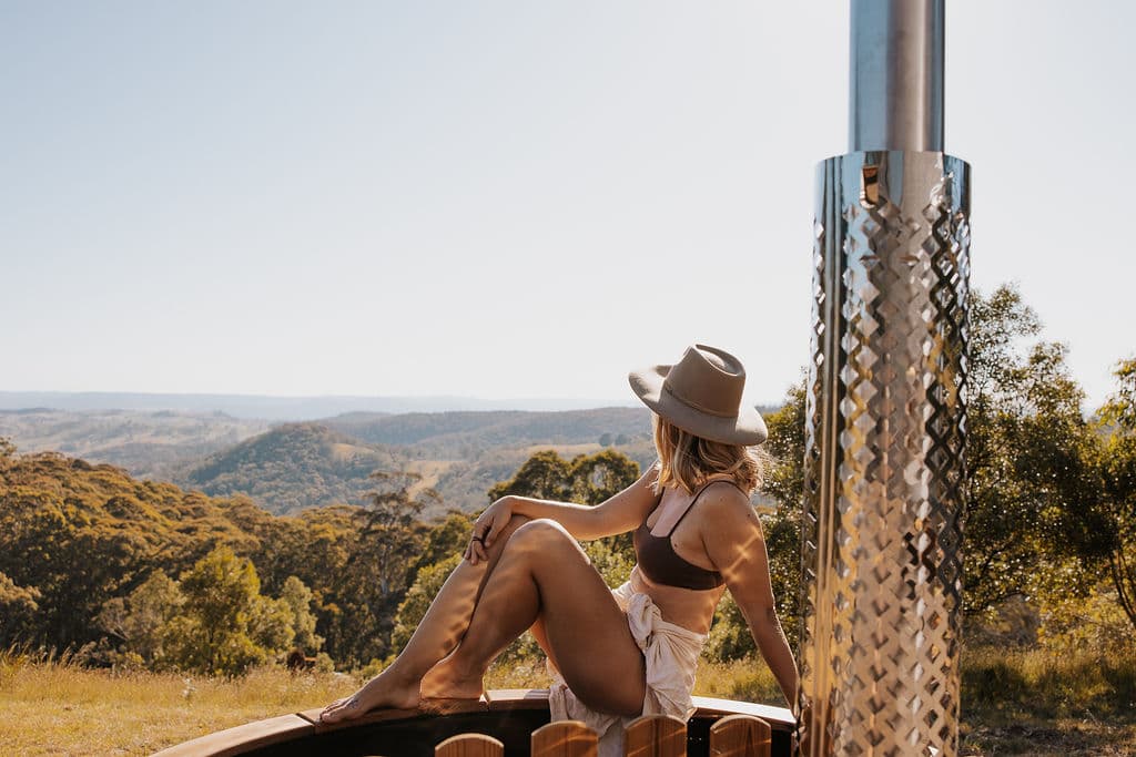Tiny Astrid tiny house with outdoor hot tub overlooking the Blue Mountains landscape