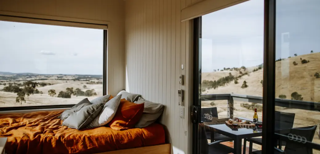 The inside view of Tiny Pip House in Heathcote looking out onto the countryside