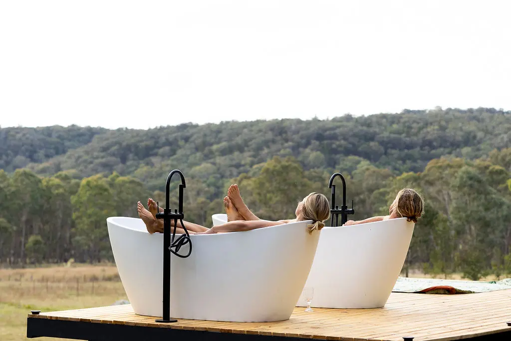 Tiny Maggie tiny house nestled among rolling hills in Mudgee, NSW